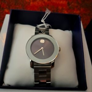$500+ NEW Movado Women's watch, silver with dark gray dial.